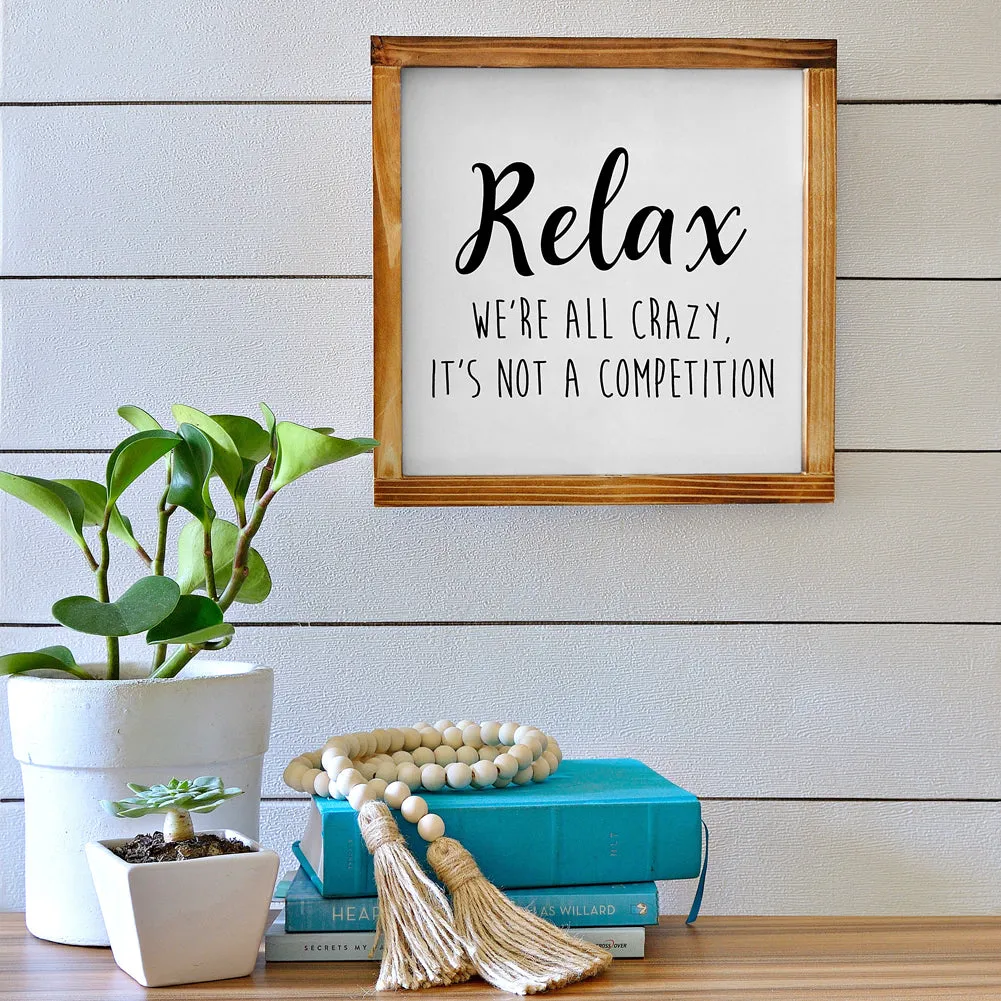 Relax We're All Crazy It's Not a Competition 12x12 Sign by MainEvent